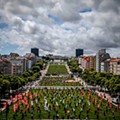 People take part in a May Day demonstration while respecting social distancing..jpg